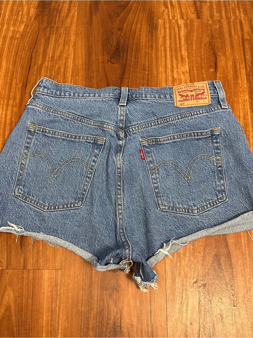 Levi's Medium Blue Denim Cutoff Shorts with Frayed Hem